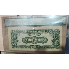 한국은행  천원 PMG64등급